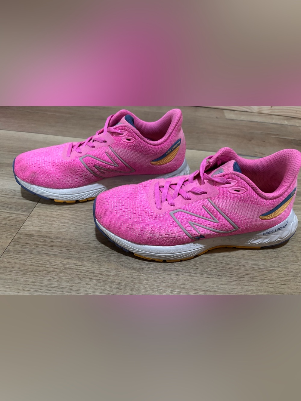 New Balance Women’s Pink and Yellow Accent Sneakers